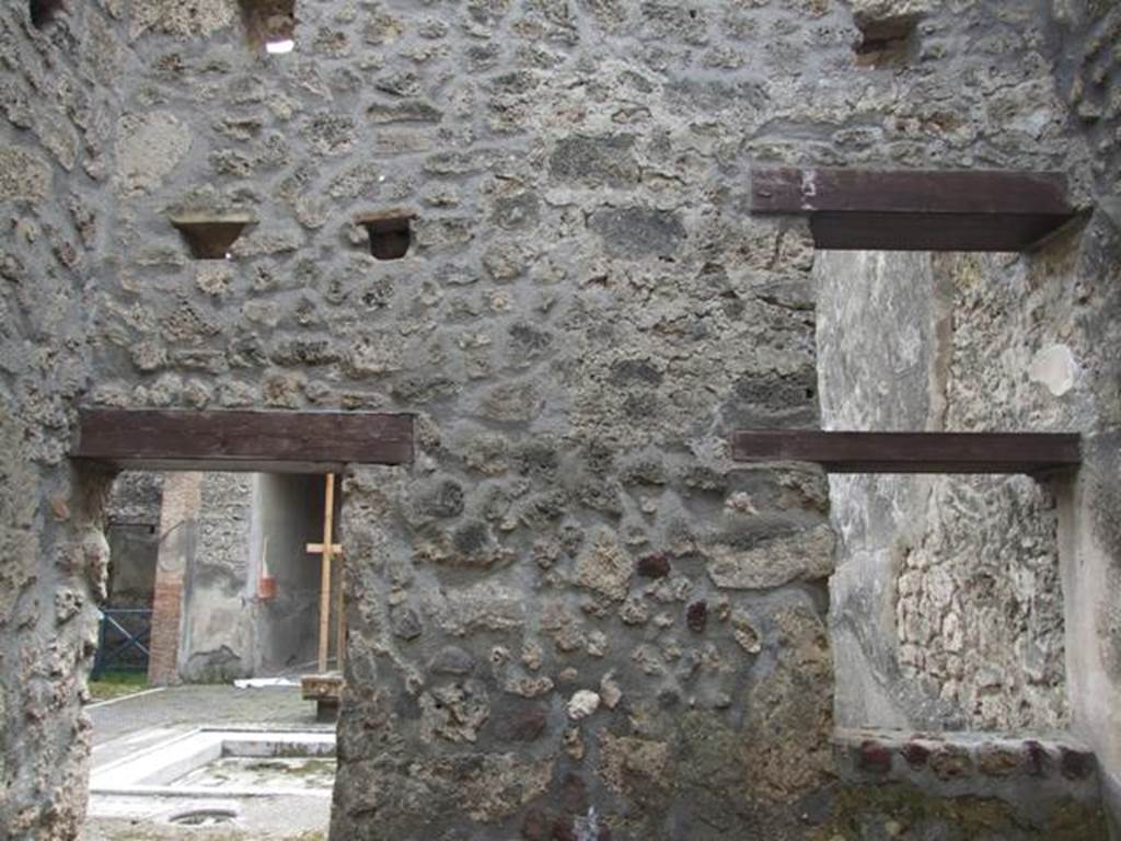 I.9.1 Pompeii.  March 2009.  Room 3, South wall with window and door to atrium.