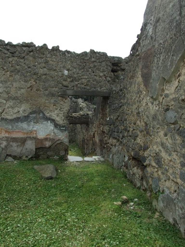 I.9.3 Pompeii. March 2009. Doorway in south west corner of garden to room 7.