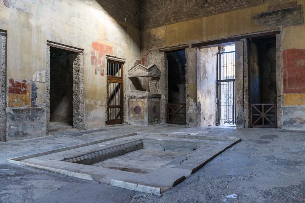 I.10.4 Pompeii. April 2022. Looking north-west across impluvium in atrium. Photo courtesy of Johannes Eber.

