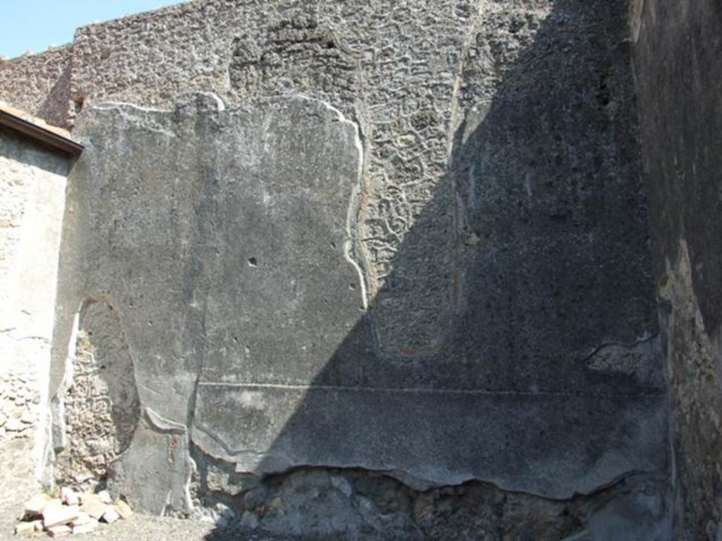 I.10.8 Pompeii. March 2009. Room 4, east wall of workroom.
According to La Rocca, de Vos, M & E, and Della Corte, in the large rustic workroom on the left side of the atrium, many of the workers left their names.
The names of the male workers included – Rarus, Rufus, Quietus, Onesimus and Primigenius.
The female workers – Gelaste and Salvilla.
The last-named woman was probably the one from CIL IV 8384, in the neighbouring room.
See La Rocca, E, de Vos, M & E, & Coarelli, F. (1981): Guida archeologica di Pompei. Milan: Mondadore (p.172)
See Della Corte, M., 1965. Case ed Abitanti di Pompei. Napoli: Fausto Fiorentino. (p.301)