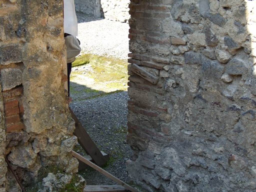 I.10.8 Pompeii. March 2009. Doorway of room 5, looking west to the atrium.