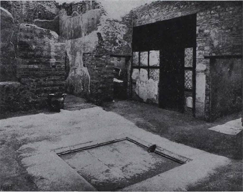 I.10.8 Pompeii. Looking towards south-east corner of atrium, and doorway to room 8, tablinum.
According to NdS, this room was not the tablinum but was a day-bedroom (cubicolo diurno). The room obtained by a screen of opus craticium with wood and masonry was an almost square day-room, in which found on the rustic floor in the ash was an imprint of the shape of a low and wide bed with wooden frame. 

Il vano ricavato da un tramezzo ad opus craticium ad ossatura di legno e di fabbrica era un cubicolo diurno quasi quadrato; nel quale sul rustico pavimento a piano di fabbrica era rimasta conservata nella cenere limpronta di un basso e largo letto a telaio di legno.

See Notizie degli Scavi, 1934, p. 312-3, fig. 25.
