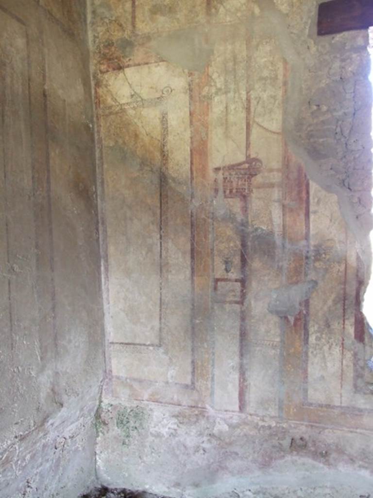 I.12.2 and I.12.1 Pompeii. March 2009. Room 7. Triclinium. North wall, west side. Painted decoration.