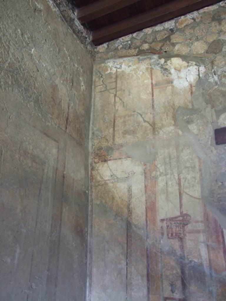 I.12.2 and I.12.1 Pompeii. March 2009. Room 7. Triclinium. North wall, west side. Painted decoration.