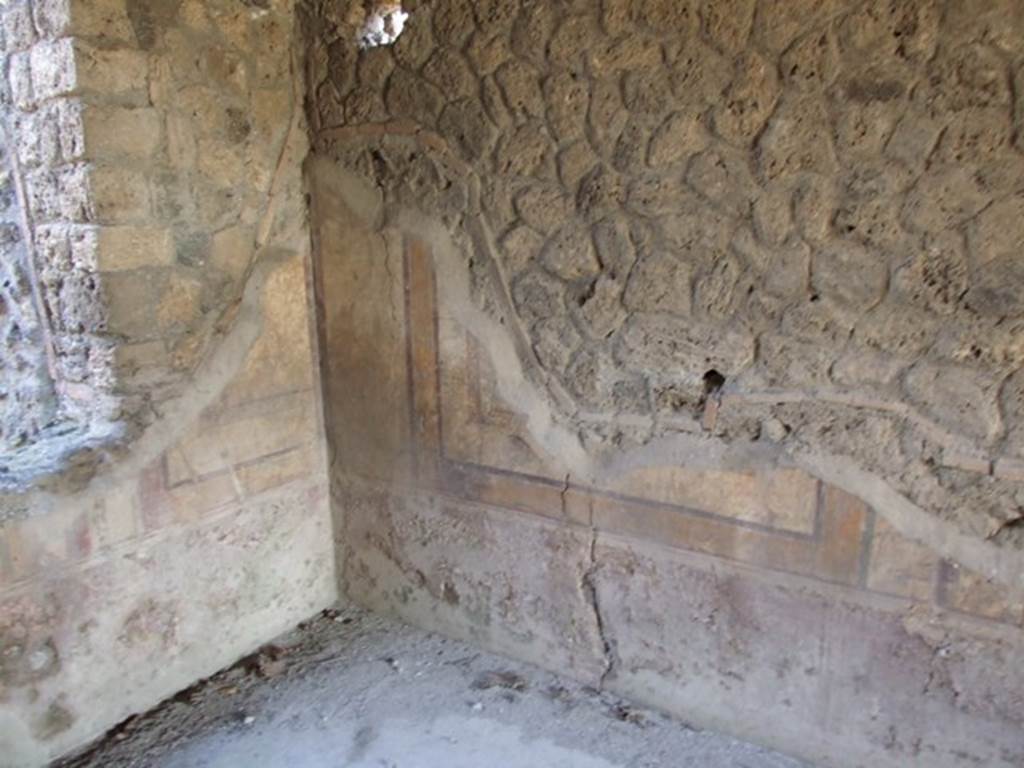 I.12.2 and I.12.1 Pompeii. March 2009. Room 7. Triclinium. North wall, east side. Painted decoration.