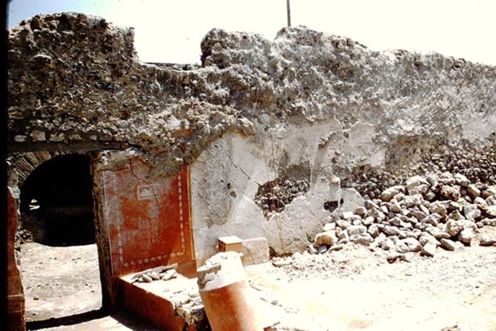 I.12.2 and I.12.1 Pompeii. 1961. Room 8, portico. Looking towards east wall of portico and garden, with doorway to room 11. Photo by Stanley A. Jashemski.
Source: The Wilhelmina and Stanley A. Jashemski archive in the University of Maryland Library, Special Collections (See collection page) and made available under the Creative Commons Attribution-Non Commercial License v.4. See Licence and use details.
J61f0244