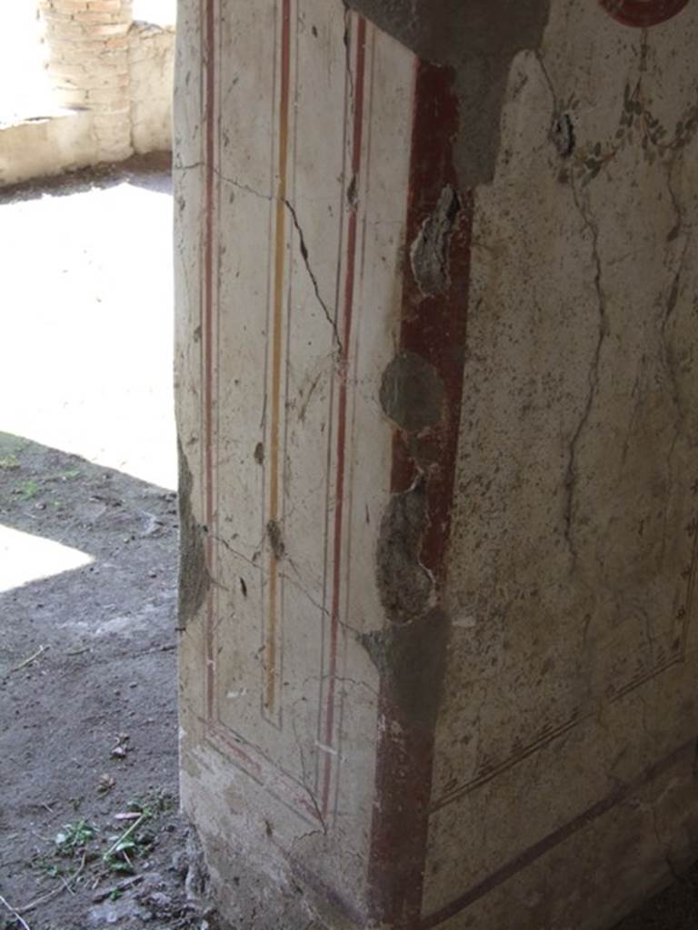 I.12.2 and I.12.1 Pompeii. March 2009. Room 9. South west door pillar.