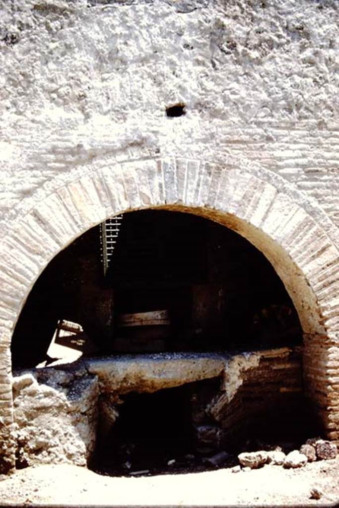 I.12.2 and I.12.1 Pompeii. 1961. Room 11, oven in bakery. Photo by Stanley A. Jashemski.
Source: The Wilhelmina and Stanley A. Jashemski archive in the University of Maryland Library, Special Collections (See collection page) and made available under the Creative Commons Attribution-Non Commercial License v.4. See Licence and use details.
J61f0250