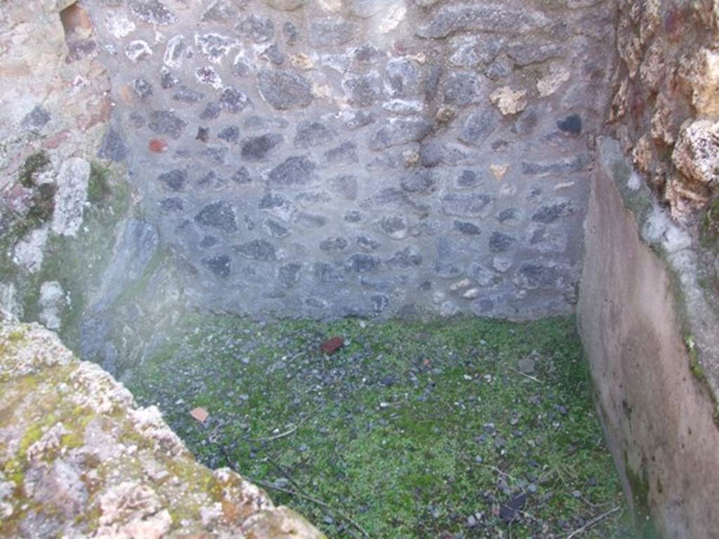 I.12.2 and I.12.1 Pompeii. March 2009. Room 14. Small area behind the south wall.