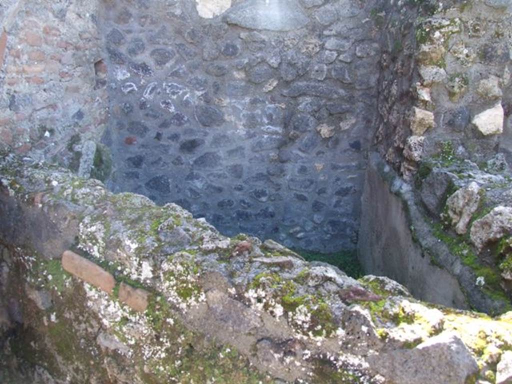 I.12.2 and I.12.1 Pompeii. March 2009 Room 14. Small area behind the south wall.