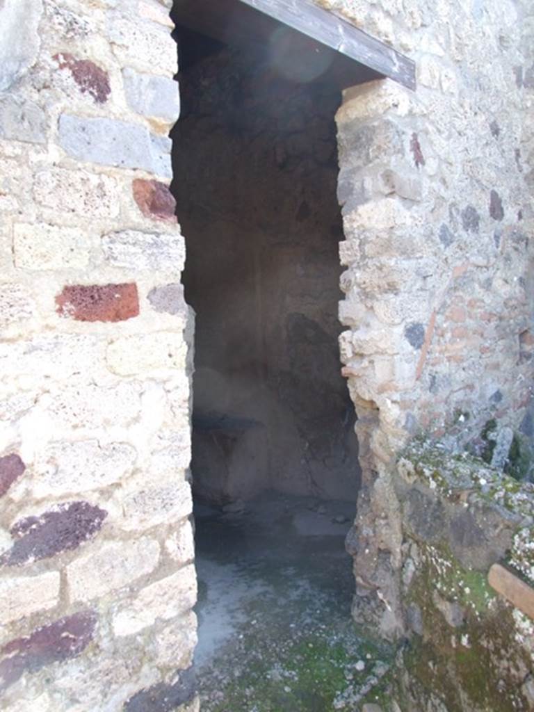 I.12.2 and I.12.1 Pompeii. March 2009. Room 15. Doorway to Latrine.
