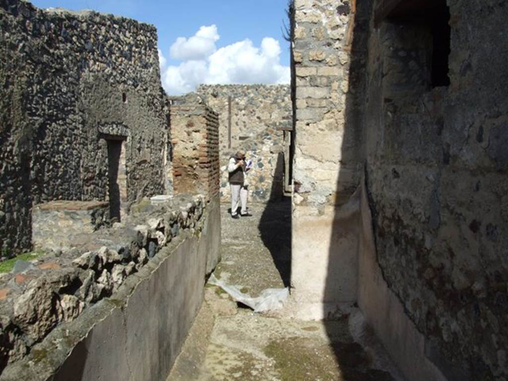 I.12.2 and I.12.1 Pompeii. March 2009. Room 14. Looking north to room 11.