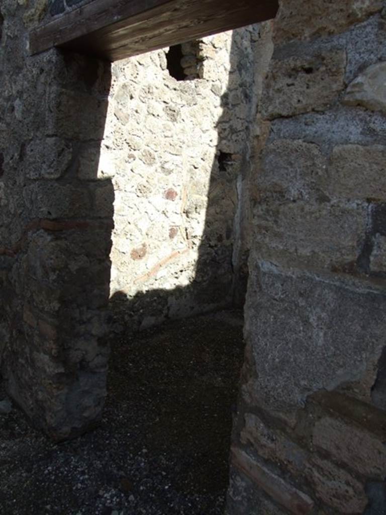 I.12.2 and I.12.1 Pompeii. March 2009. Doorway to Room 18.