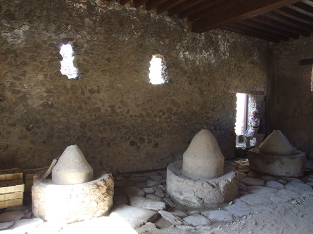 I.12.2 and I.12.1 Pompeii. March 2009. Room 3. West wall and mills.