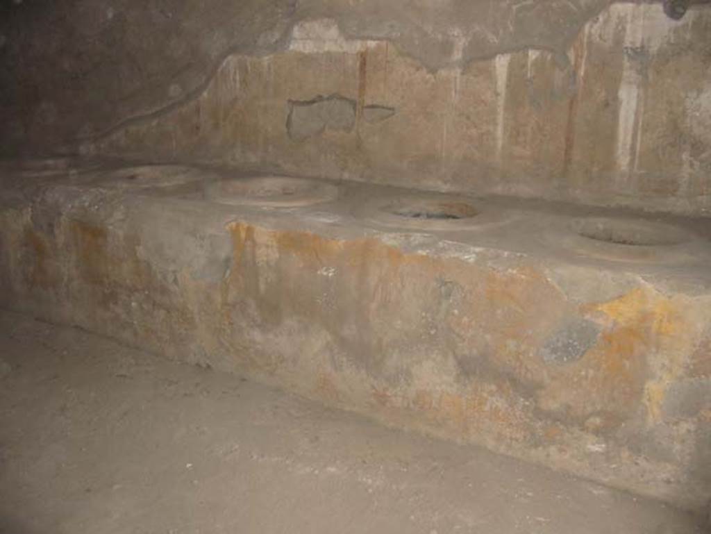 I.12.3 Pompeii. May 2003. Room 1, west wall of courtyard. Photo courtesy of Nicolas Monteix.