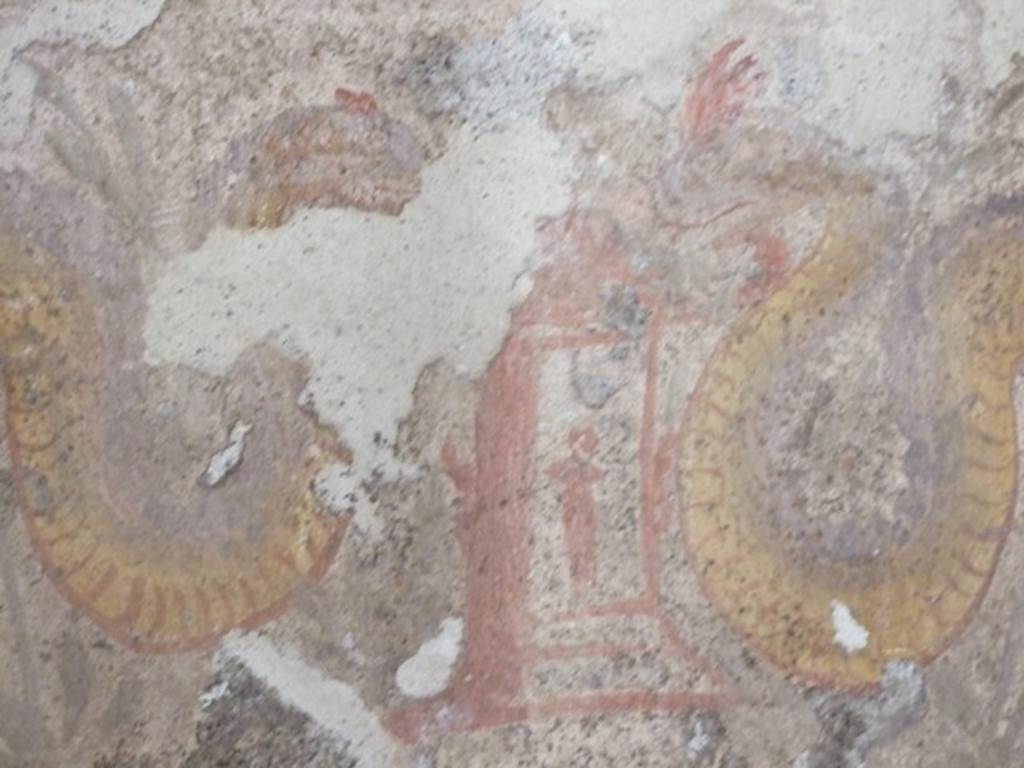 I.12.3 Pompeii.  March 2009.   Room 4.  Lararium.  Detail of  Altar between the two serpents.