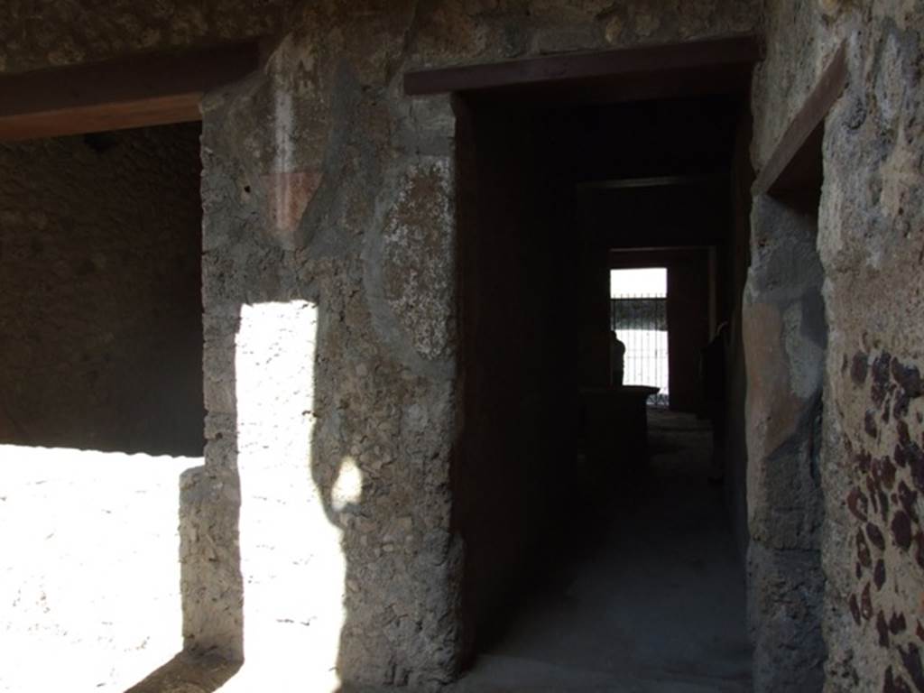 I.12.3 Pompeii.  March 2009.  Looking north from garden area to caupona.