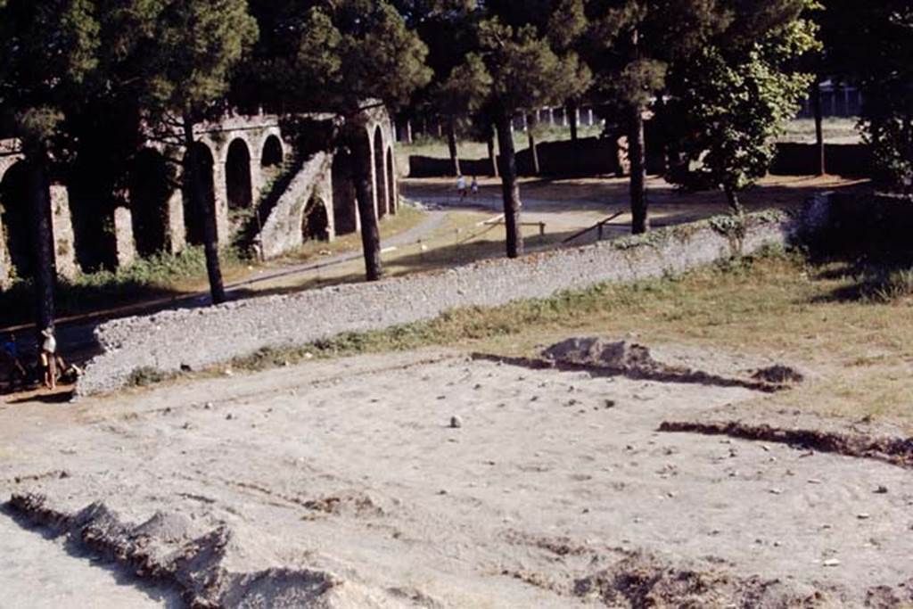 II.5 Pompeii, 1968. Looking south-west towards amphitheatre and palaestra. Photo by Stanley A. Jashemski.
Source: The Wilhelmina and Stanley A. Jashemski archive in the University of Maryland Library, Special Collections (See collection page) and made available under the Creative Commons Attribution-Non Commercial License v.4. See Licence and use details.
J68f0474