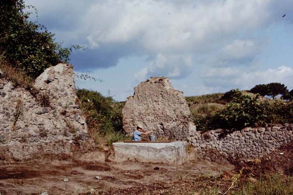 II.5 Pompeii, 1968. Obtaining water for the cement. Photo by Stanley A. Jashemski.
Source: The Wilhelmina and Stanley A. Jashemski archive in the University of Maryland Library, Special Collections (See collection page) and made available under the Creative Commons Attribution-Non Commercial License v.4. See Licence and use details.
J68f0846