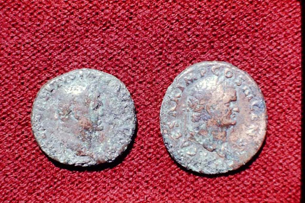 II.5 Pompeii, 1968. Detail of coins. Photo by Stanley A. Jashemski.
Source: The Wilhelmina and Stanley A. Jashemski archive in the University of Maryland Library, Special Collections (See collection page) and made available under the Creative Commons Attribution-Non Commercial License v.4. See Licence and use details.
J68f1783