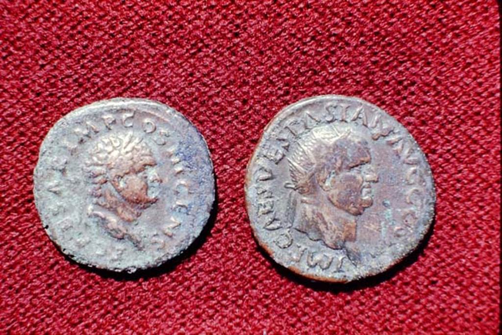 II.5 Pompeii, 1968. Detail of coins. Photo by Stanley A. Jashemski.
Source: The Wilhelmina and Stanley A. Jashemski archive in the University of Maryland Library, Special Collections (See collection page) and made available under the Creative Commons Attribution-Non Commercial License v.4. See Licence and use details.
J68f1785