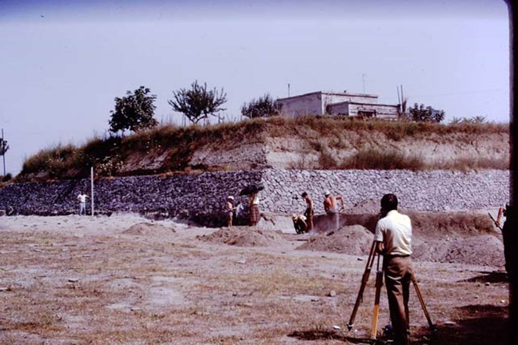 II.5 Pompeii. 1970. Looking north-east towards new retaining wall. Wilhelmina had asked if it would be possible to send the Scavi surveyor to the site, and when the work was finally finished the surveyor came and made a topographical study of the area. Photo by Stanley A. Jashemski.
Source: The Wilhelmina and Stanley A. Jashemski archive in the University of Maryland Library, Special Collections (See collection page) and made available under the Creative Commons Attribution-Non Commercial License v.4. See Licence and use details.
J70f0682
