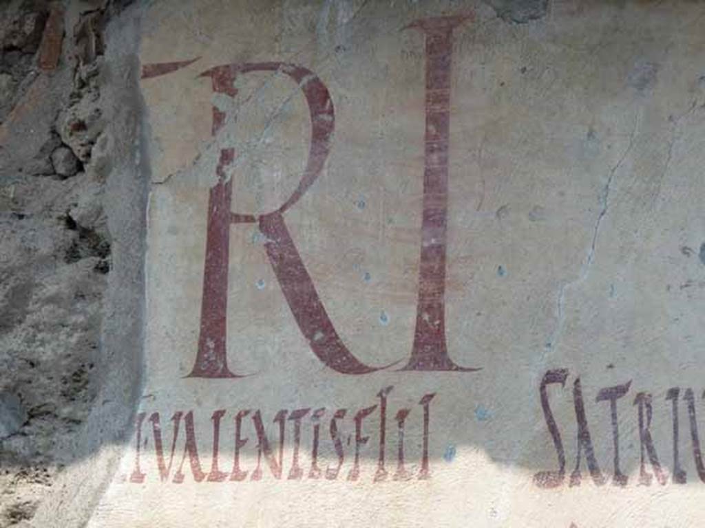 III.2.1 Pompeii. May 2010. Graffiti outside House of Aulus Trebius Valens.  