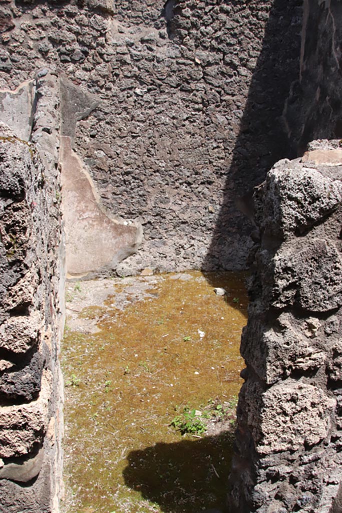 V.1.7 Pompeii. May 2024. 
Room 11, looking through doorway towards east wall. Photo courtesy of Klaus Heese.
