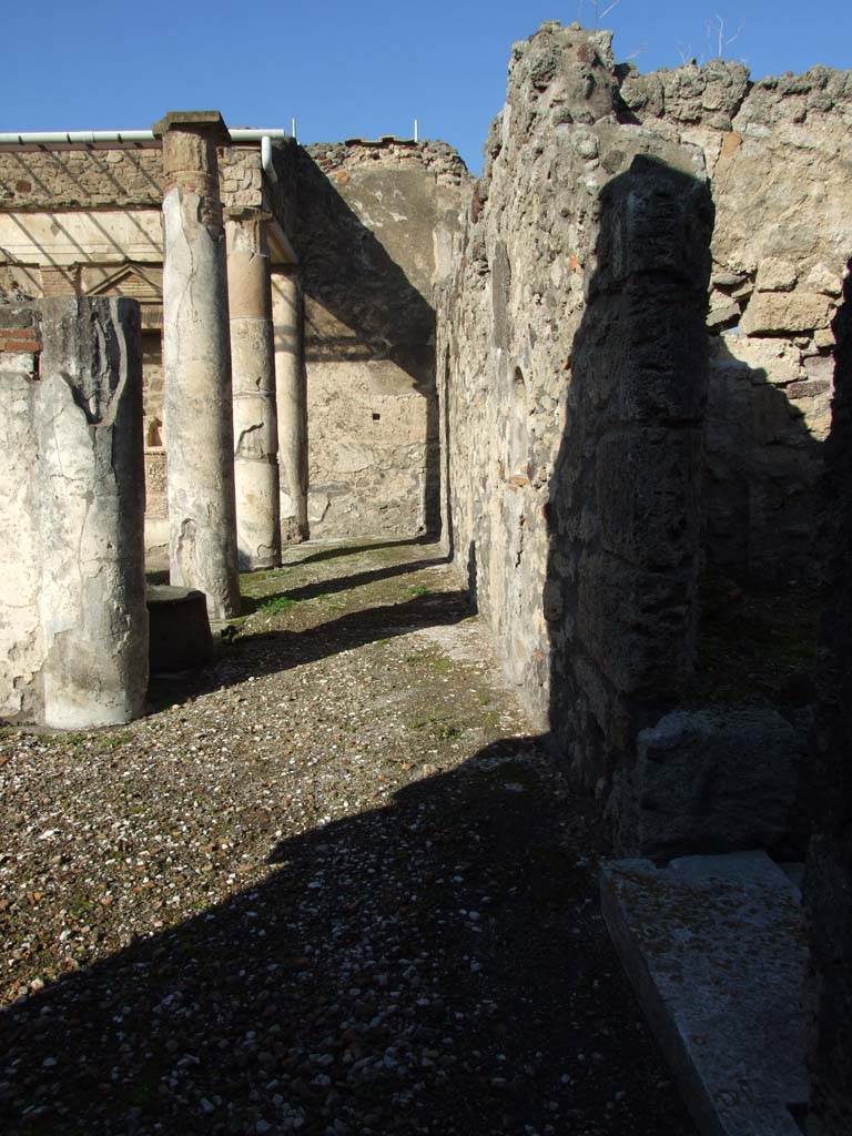 V.1.7 Pompeii. December 2007. Looking north along east side of peristyle from outside room 16a.