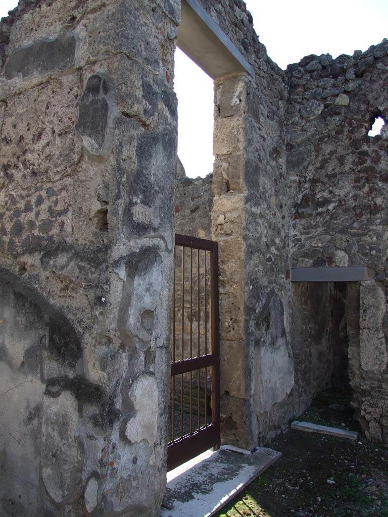 V.1.7 Pompeii. December 2007. Doorway in south-west corner of atrium leading to rear of V.1.6.