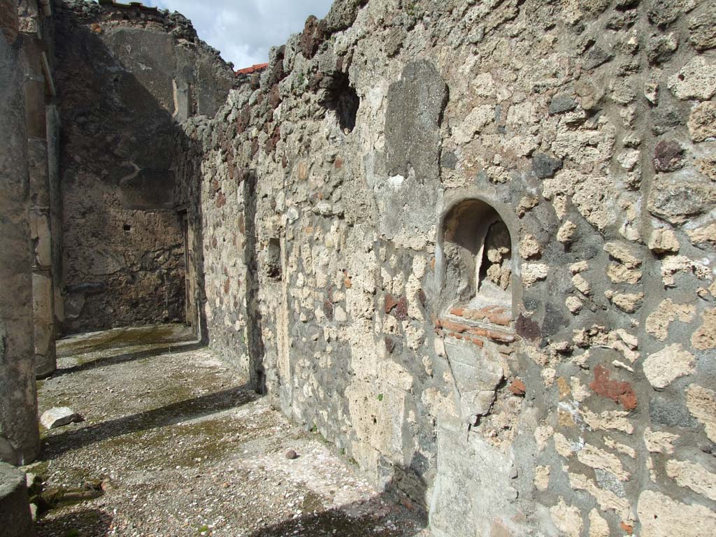 V.1.7 Pompeii. March 2009. Looking north along east side of peristyle.