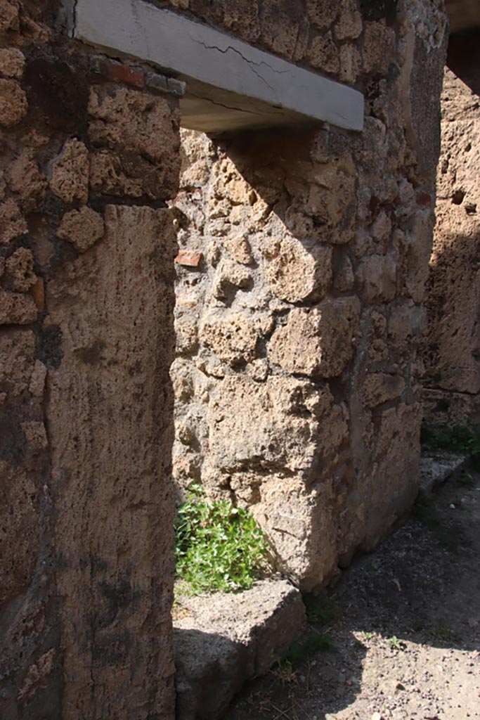 V.3.8 Pompeii. October 2023.
Two doorways to rooms on west side of entrance corridor. Photo courtesy of Klaus Heese.