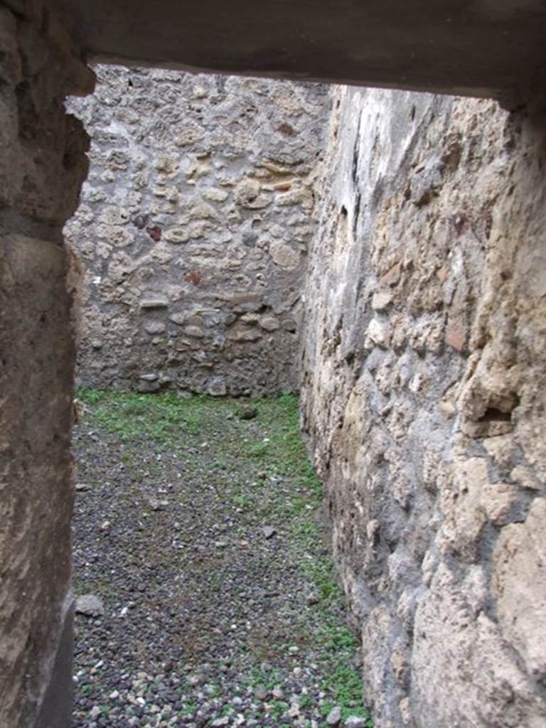V.3.8 Pompeii. December 2007. Looking towards west wall from doorway to front room on west side of entrance corridor.