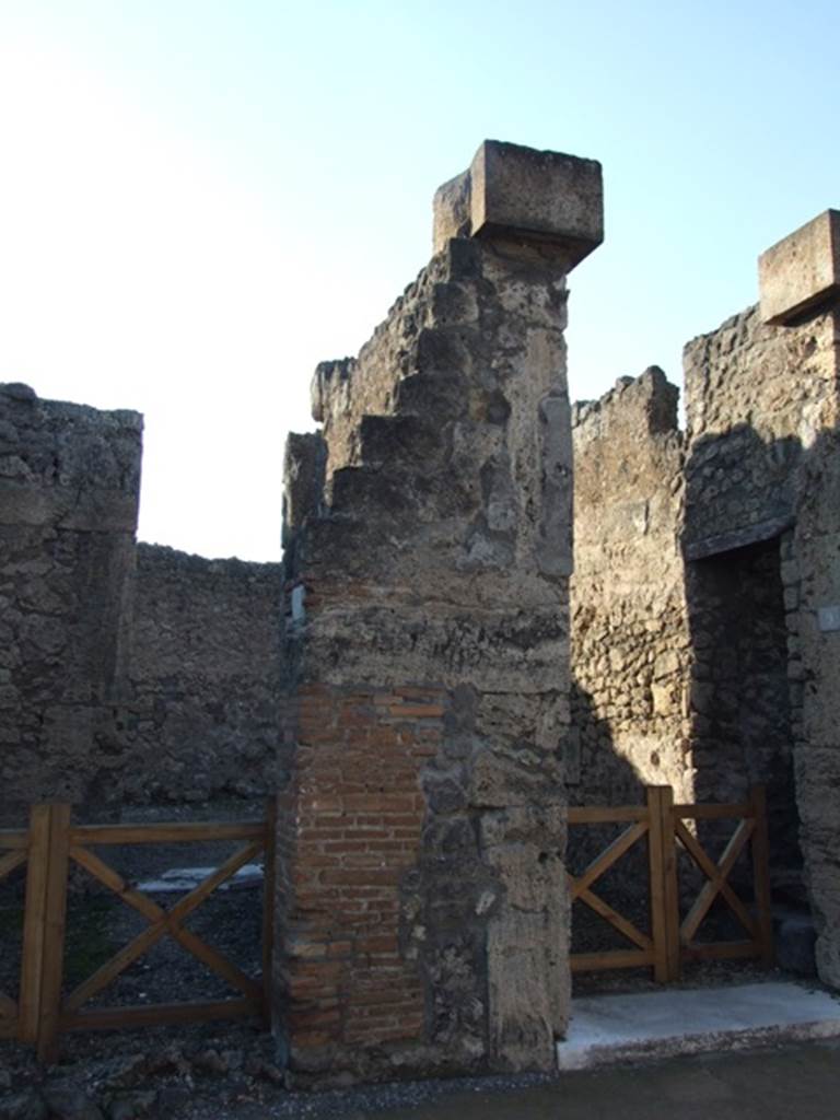 VI.7.9 Pompeii.  December 2007.  Pilaster between VI.7.8 and VI.7.9, which had the wall painting of the Procession of the Carpenters.   