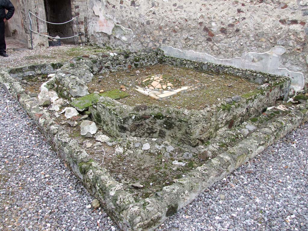 VI.7.23 Pompeii. December 2006. Remains of pyramidal fountain in courtyard, looking south-east.  