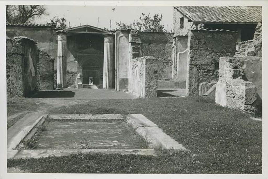 VI.8.22 Pompeii. March 1939. Looking towards north-west corner of atrium, across impluvium.  Photo courtesy of Rick Bauer.
