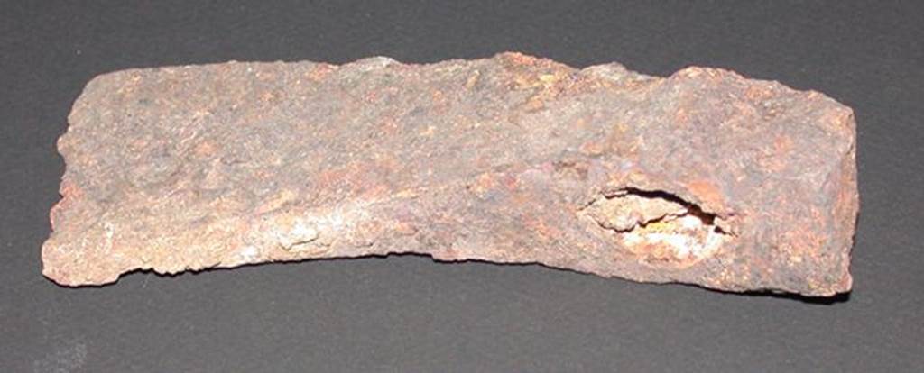 VI.9.1 Iron axe head, rear view.  Height 0.033m, width 0.057m, length 0.14m.  
OA 2811 Hache, muse Cond, photo RMN  R.G. Ojeda