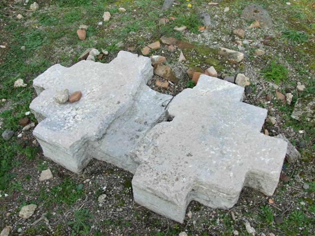 VI.9.1 Pompeii. December 2007. Travertine foundation of strongbox, on east side of atrium.