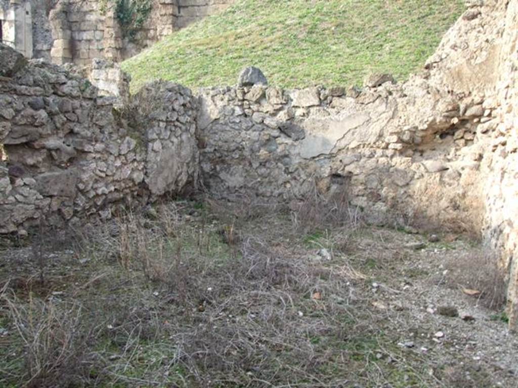 VI.9.14 Pompeii. December 2007. Large oecus 31 in north-west corner, looking north.
According to Packer, when found the north wall of this room was decorated with white panels separated by broad red borders above a low red dado.
See Cronache Pompeiane, IV, 1978, for article by Packer, J: Inns at Pompeii: a short survey (p.24-30)
See Bullettino Archeologico Napolitano, 1, 1843, p.68-70.
