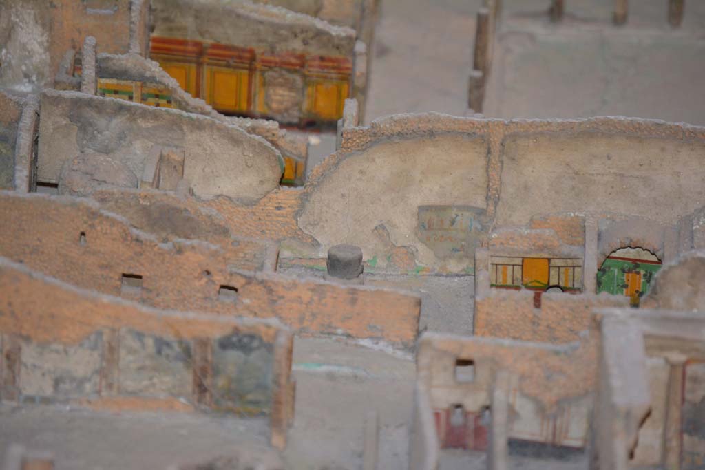 VI.11.9/10 Pompeii. July 2017. Across centre, looking east towards bakery wall in room 16 with lararium painting.
In the centre, on the right, are the painted east walls of room 20 and 21 of the baths area.
Note the entrance doorway, now blocked, leading from Vicolo del Fauno directly into the bakery.
From cork model in Naples Archaeological Museum.
Foto Annette Haug, ERC Grant 681269 DCOR.
