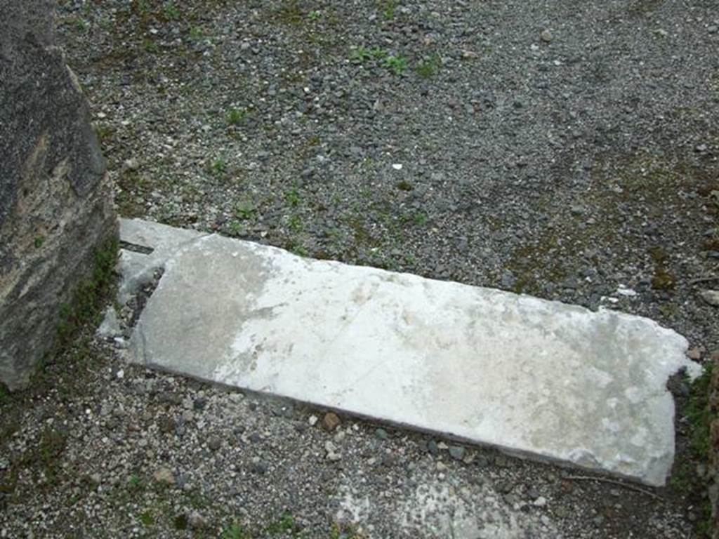 VI.11.10 Pompeii. March 2009. Room 35, marble threshold of doorway.