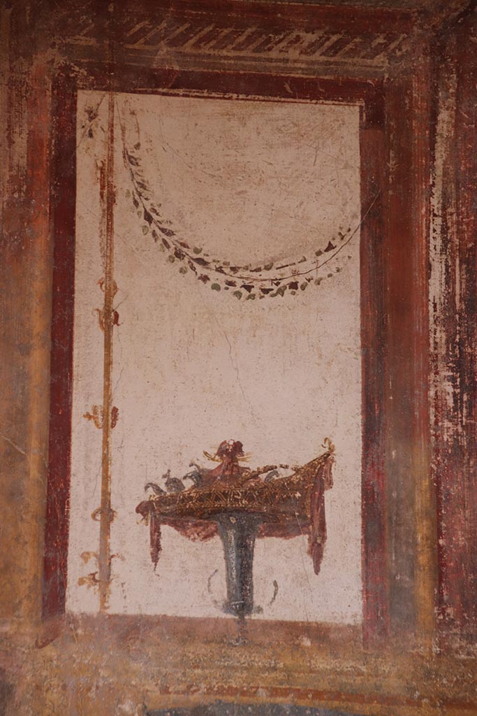 VI.15.1 Pompeii. October 2024. 
Detail from upper west wall at north end. Photo courtesy of Klaus Heese.
