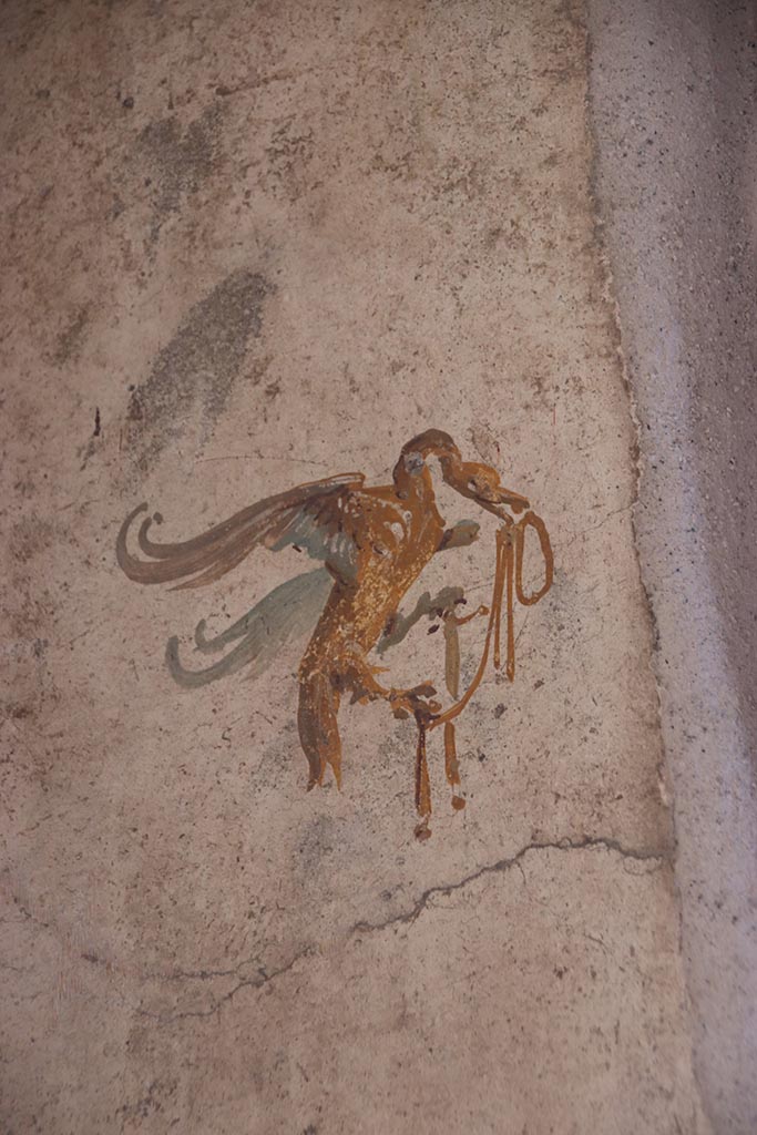 VI.15.1 Pompeii. October 2024. 
Room (f), detail of painted swan on north wall in north-west corner of bedroom to the south of atrium.
Photo courtesy of Klaus Heese.
