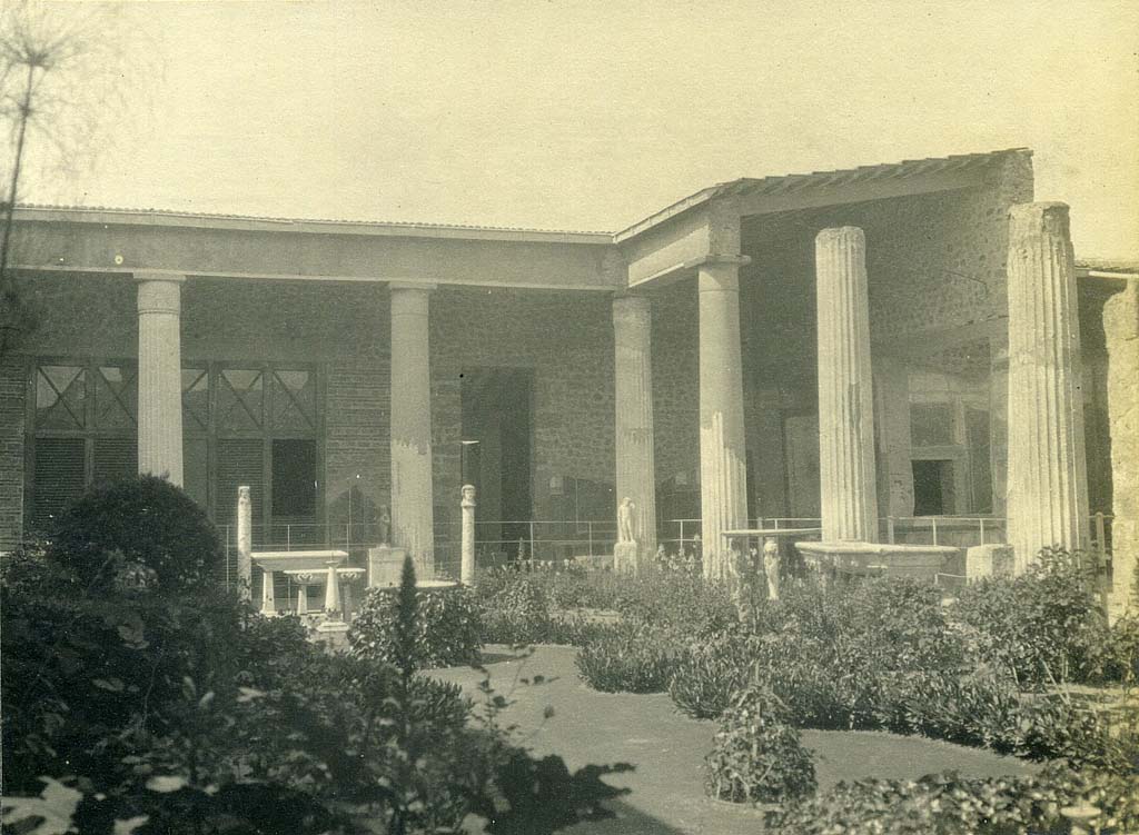 VI.15.1 Pompeii. 5th June 1925. Looking towards the north and north-east corner of the peristyle. Photo courtesy of Rick Bauer.