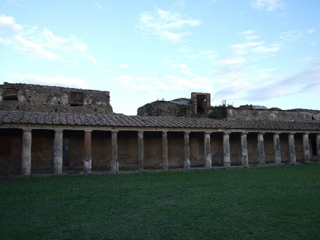 VII.1.8 Pompeii. December 2006. Looking to the east across gymnasium C from north-west corner.