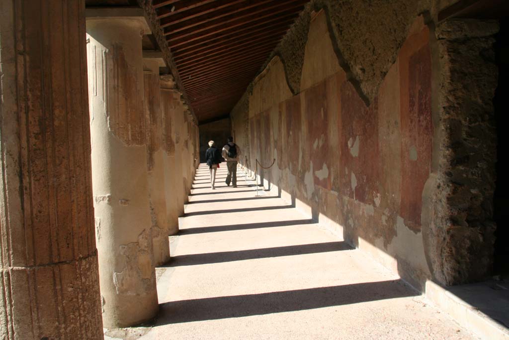 VII.1.8 Pompeii. April 2013. Corridor on east side of portico B, looking north. Photo courtesy of Klaus Heese.