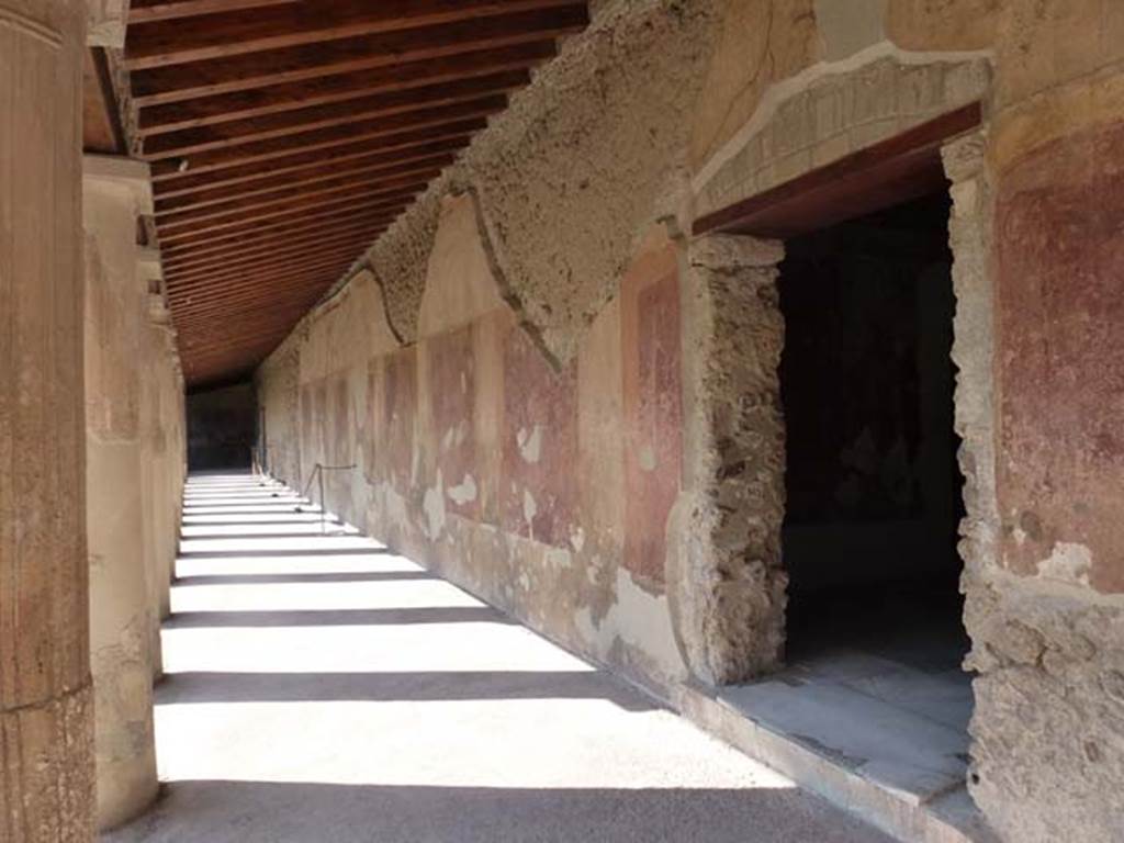 VII.1.8 Pompeii. June 2012. Corridor on east side of portico B, looking north. Photo courtesy of Michael Binns.
