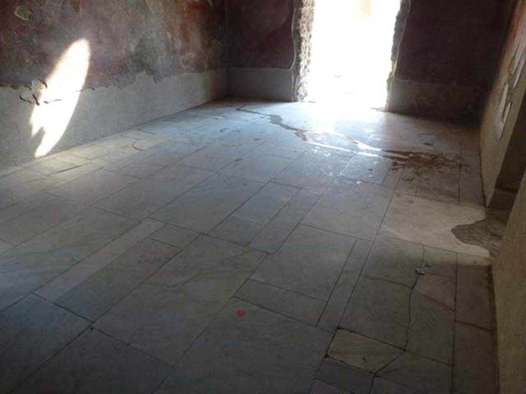 VII.1.8 Pompeii. June 2012. Looking west across floor of vestibule 1 towards entrance doorway from portico B. The doorway to frigidarium 4 is on the right.  Photo courtesy of Michael Binns.