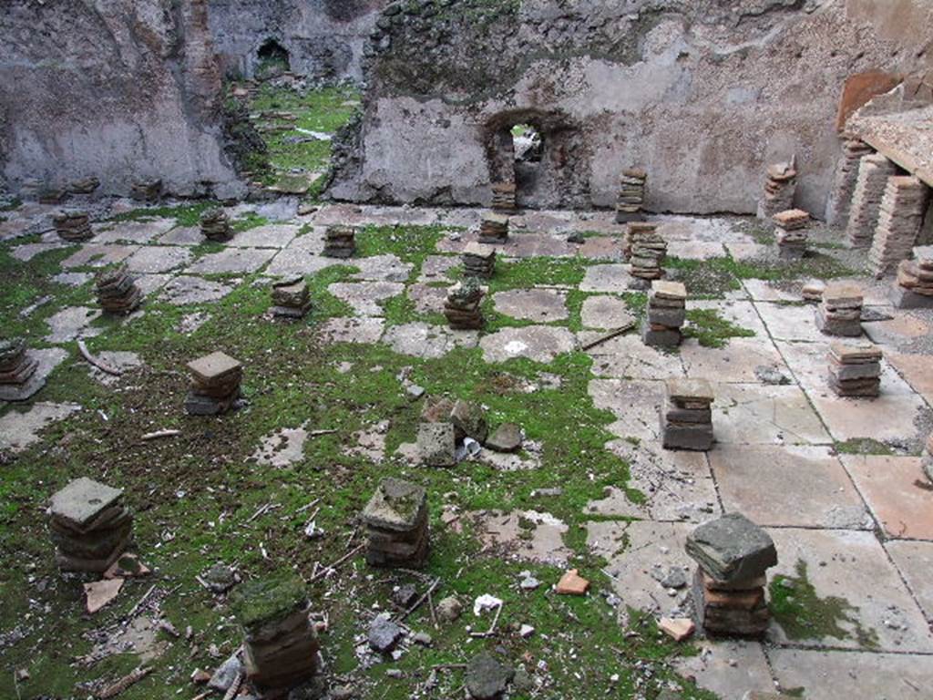 VII.1.8 Pompeii. December 2006. Hypocaust supports in tepidarium 3, looking north.