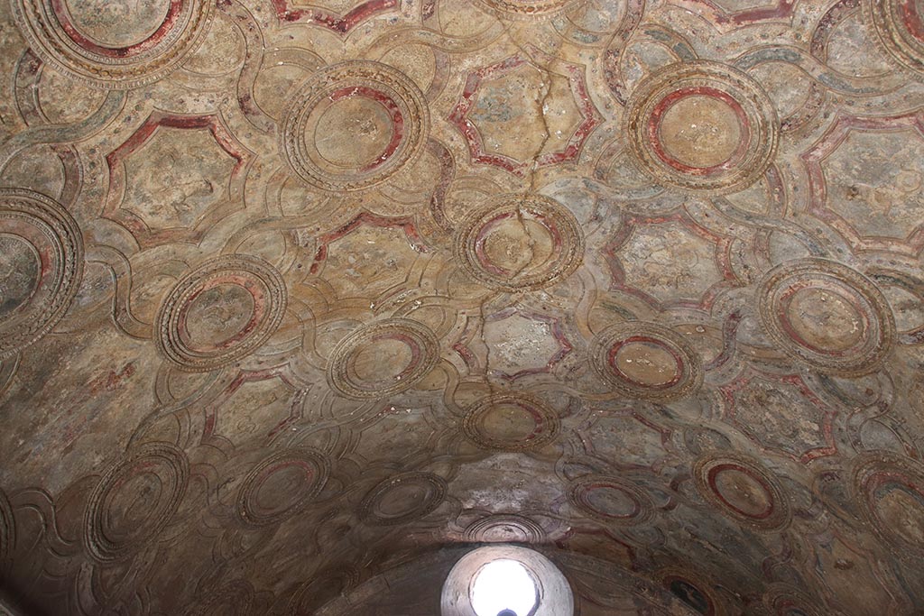 VII.1.8 Pompeii. October 2024. Vestibule 1, looking west across stucco ceiling. Photo courtesy of Klaus Heese.